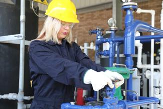 Female with uniform and hard hat